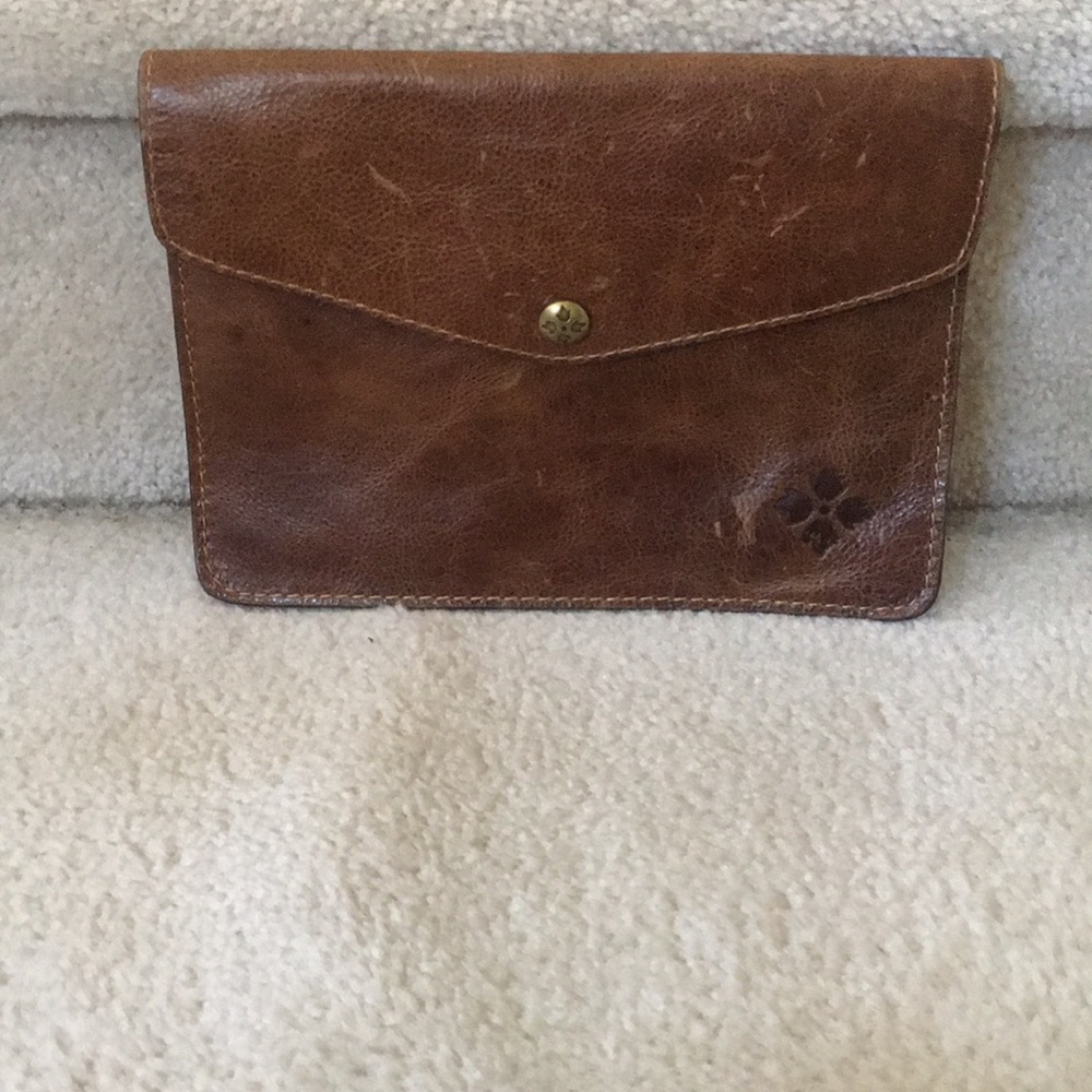 Small, Patricia Nash clutch.